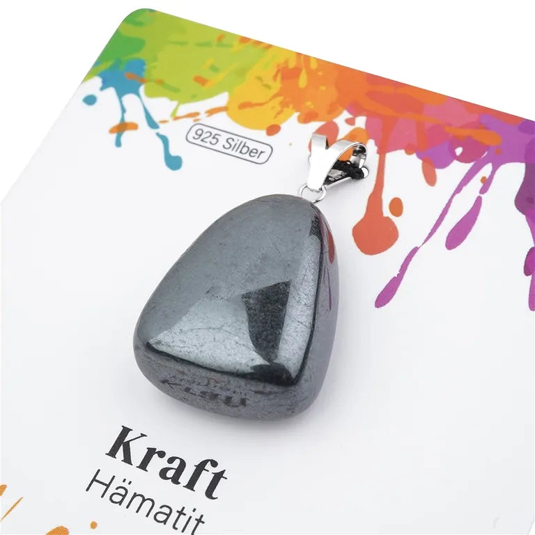 Kraft – Hämatit Trommelstein 2–3 cm mit 925er Silber-V-Öse
