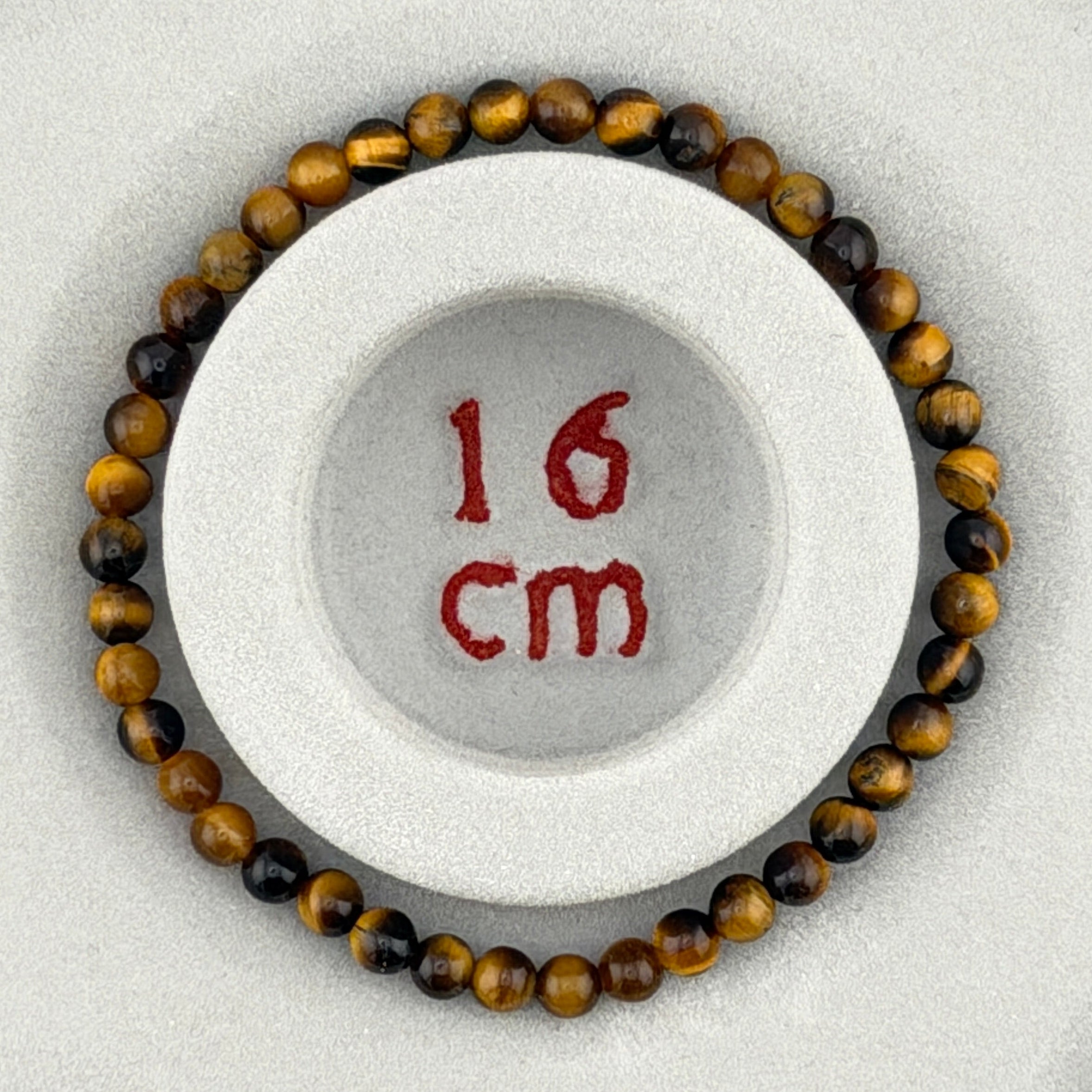 Tigerauge (gold) – Armband mit 4-mm Kugeln (elastisch, ca. 18 cm)